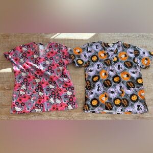Two Hello Kitty scrub tops.  Size medium